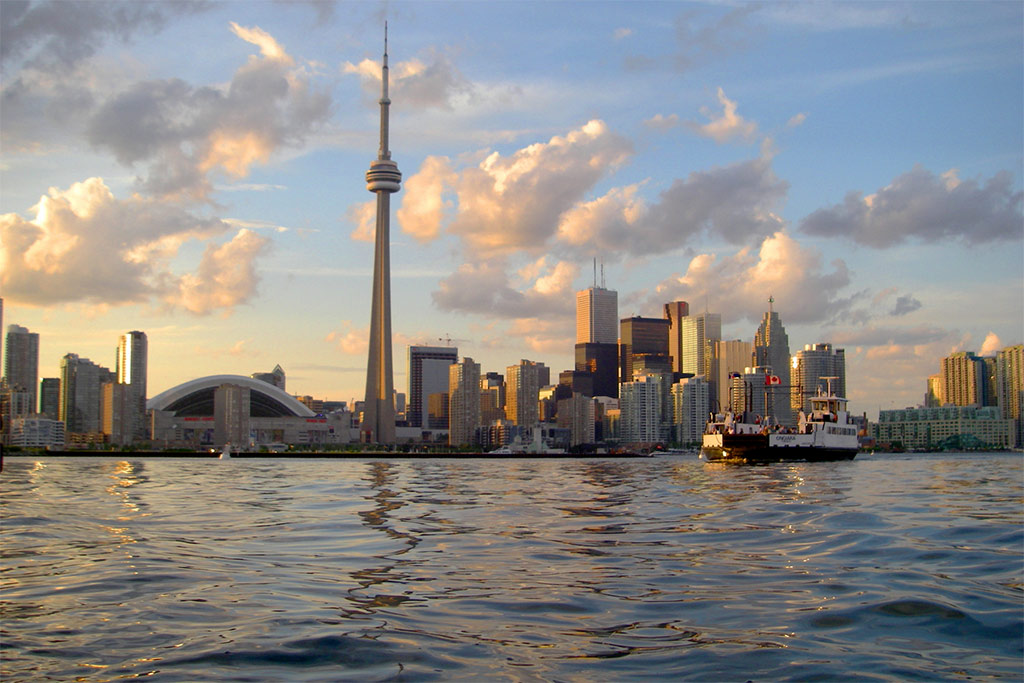 View of downtown Toronto from Lake Ontario with CN Tower and the Dome