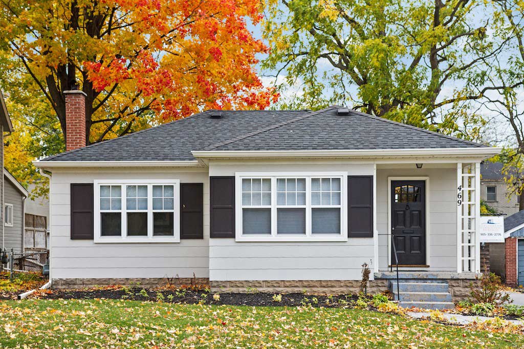 Exterior of a renovated bungalow in downtown Burlington on a beautiful fall day